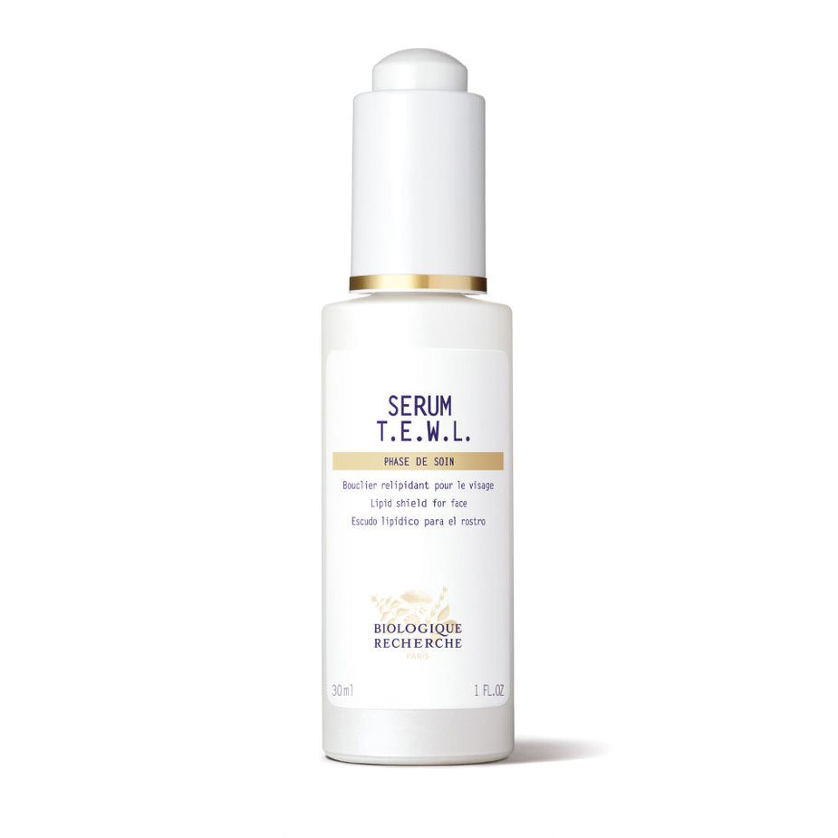 Biologique Recherche Sérum T.E.W.L. 1.0 fl.oz – A white skincare bottle with a branded white label featuring dark blue lettering and gold accents, displayed upright on a white background. This intensive hydrating and barrier-repair serum is designed to prevent trans-epidermal water loss and deeply nourish extremely dry or dehydrated skin.